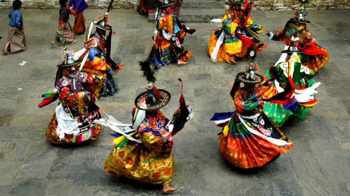 Black Hat Cham dancers wearing sorcerer hats with painted mandalas, Yungdrung Choeling Dzong, Bhutan, 2006. From Core of Culture