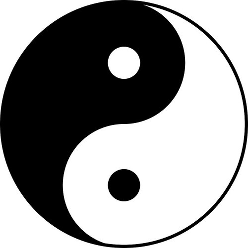 The <em>tai chi</em> symbol, representing the forces of <em>yin</em> and <em>yang</em> in harmonious movement and balance, the seed of each within the other. Traditional. From Core of Culture
