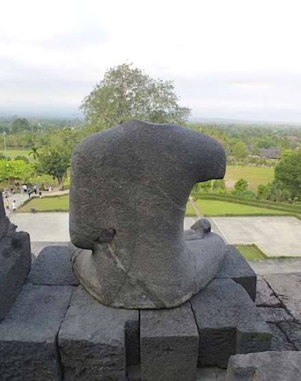 Decapitated Buddha statues at Borobudur. Images courtesy of the author